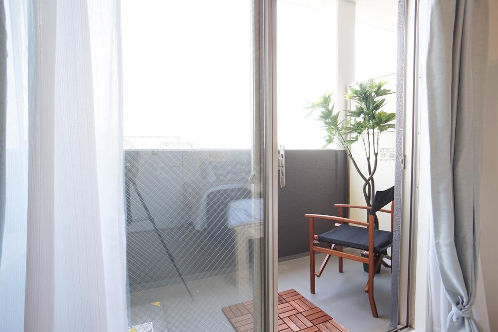Uro Apartment Osaka Esterno foto