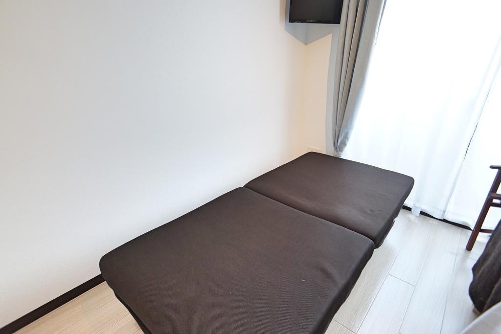 Uro Apartment Osaka Esterno foto