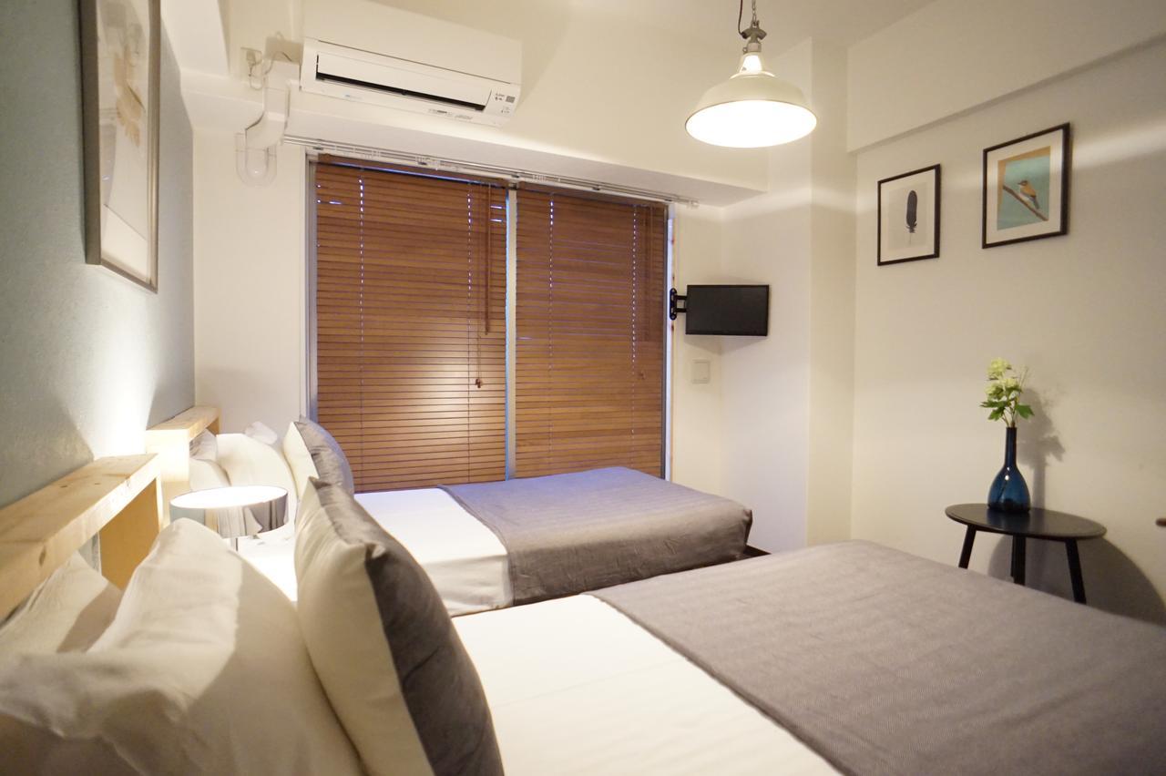 Uro Apartment Osaka Esterno foto